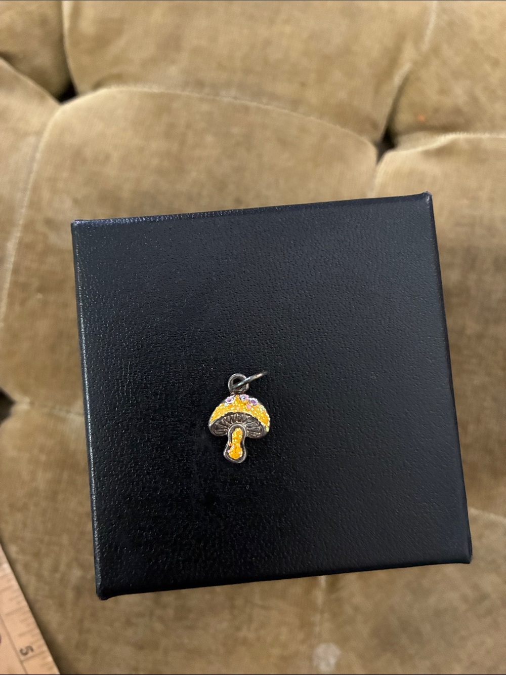 Tiny yellow mushroom charm